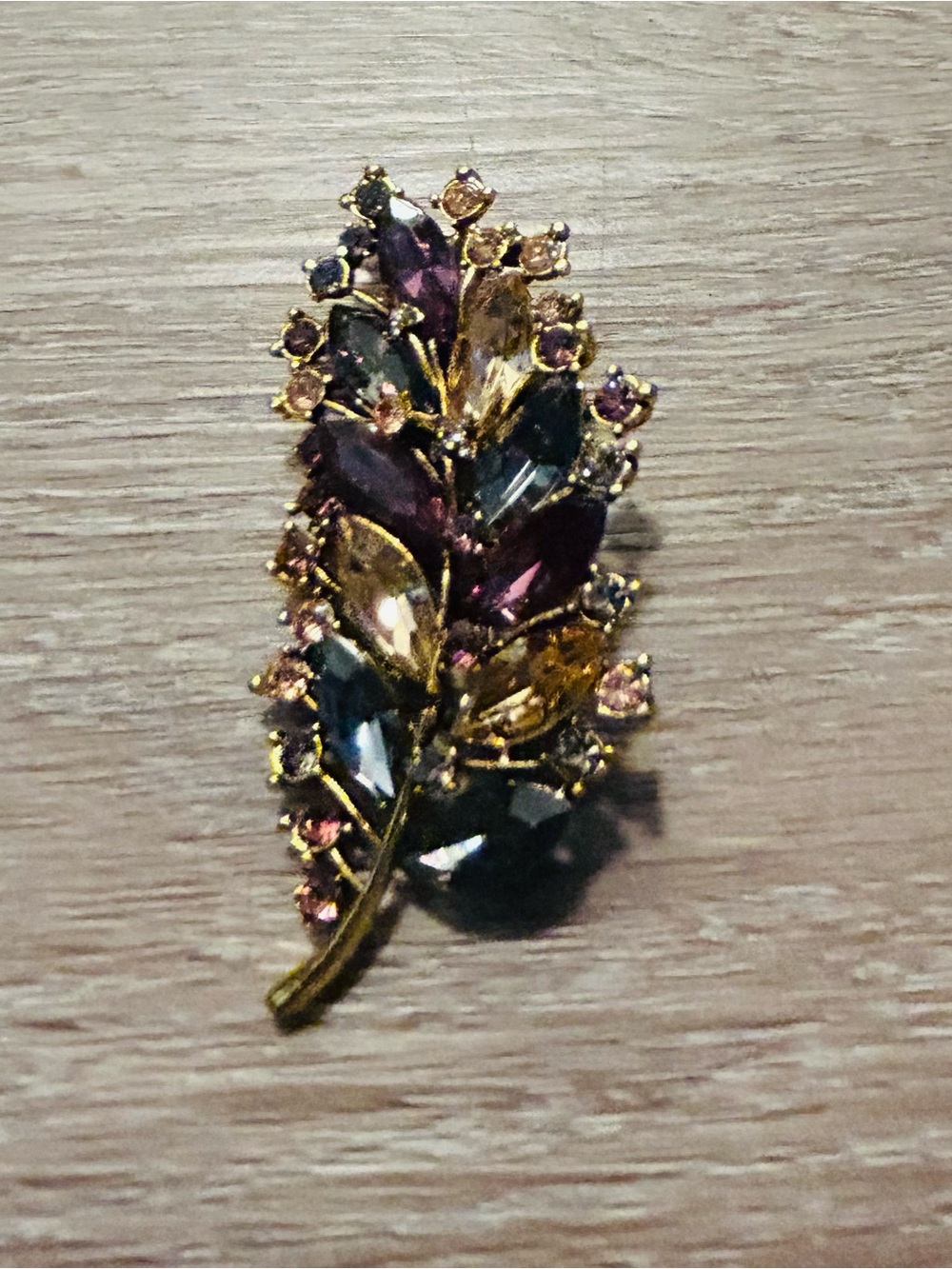 Gold-Tone Leaf Brooch with Purple and Amber Crystals